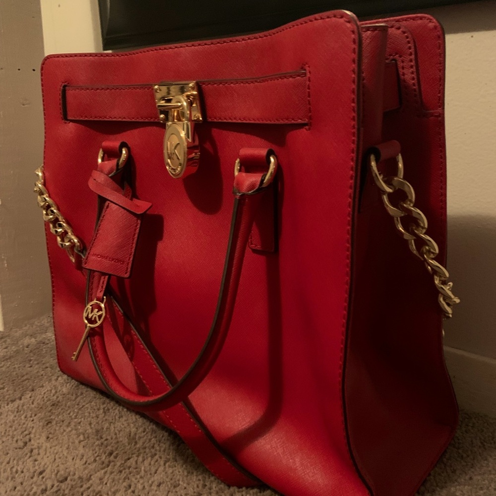 Bright red Michael Kors purse